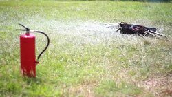 Hand spraying fire extinguisher Stock Footage