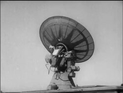 B/W 1947 low angle radar dish spinning while timing Yeager's Bell X-1 airplane flight / CA / newsreel Stock Footage