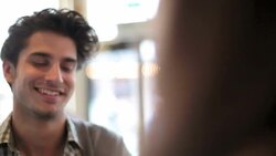 A young man takes a photograph of his girlfriend. Stock Footage