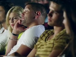 Guy with cellphone in Cinema Stock Footage