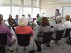 HD DOLLY: Adults Participating The Group Discussion Stock Footage