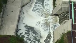 Polluted water emptying into a water drainage canal in Mexico City. Stock Footage