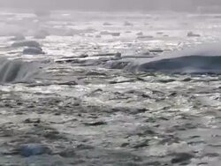 MS PAN Edge of Horse shoe Falls in winter / Niagara Falls, Ontario, Canada Stock Footage