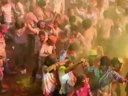 Group of people playing holi and dancing, Delhi, India Stock Footage