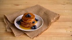 Stack of pancakes with fresh blueberry Stock Footage