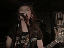 MS Female guitarist singing on stage / Nakano, Tokyo, Japan Stock Footage