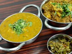 Assorted Indian Food served on a Dining Table Stock Footage