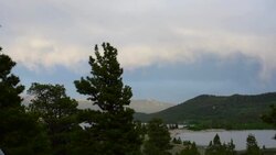 Clouds Pass over Twin Lakes Colorado on a Fishing and Camping Trip to the Rocky Mountains Stock Footage