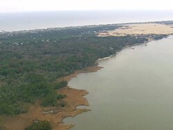 WS AERIAL View of Jockey's Ridge State Park with lake/ North Carolina, United States Stock Footage