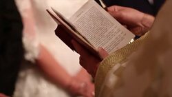 Holding a bible Stock Footage