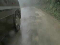 MS LA POV driving on wet road / Sam Nuea, Laos Stock Footage
