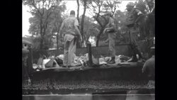 CAN774 AMERICAN MILITARY POLICE FIRE WILDLY AFTER BLAST IN SAIGON - SIX DEAD News Clip