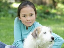 MS Girl on lawn with dog / Richmond, Virginia, United States Stock Footage