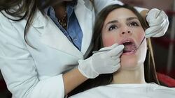 Mending patient's teeth Stock Footage