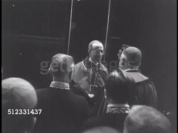 1936: PACELLI TOURING: HA WS Train arriving in station. Papal Secretary of State Cardinal Eugenio Pacelli (later Pius XII) leaving train, greeting others in station. VS Cardinal Eugenio Pacelli walking in processions. HA VS Crowds. Instructional Video