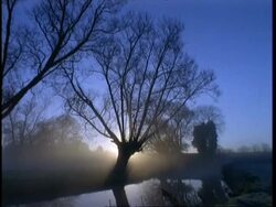 MS Early morning mist blowing across river, Winter, Autumn Stock Footage