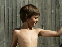 Boy with muscles (Shot on Red) Stock Footage