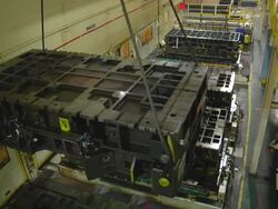 MS PAN Worker using remote control hoist to moving die from stamping presses in an auto assembly plant / Princeton, Indiana, United States Stock Footage