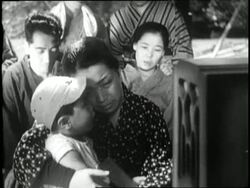 Citizens of Japan react with sadness as Emperor Hirohito announces the Japanese surrender on August 15, 1945. News Clip