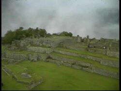 Machu Picchu, pan left across ruins, MS, Peru Stock Footage