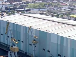 MS AERIAL DS View of shipyard / Wismar Wal, Mecklenburg Vorpommern, Germany Stock Footage