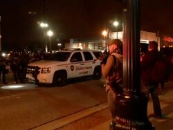Police and protestors out following Darren Wilson jury decision Stock Footage