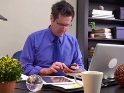 Working from home office using a tablet, laptop and smartphone Stock Footage