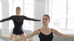 Young female ballet dancer practicing in rehearsal room Stock Footage