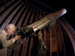 Old man in observatory Stock Footage