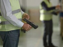 Warehouse Employee Scans Informations From Boxes Stock Footage