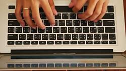 Close-up of woman hands typing on Laptop Stock Footage