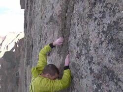 CU TS SLO MO Shot of climber struggling on big rock face and falling / Estes Park, Colorado, United States Stock Footage