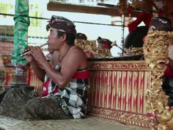MS Shot of man playing flute AUDIO / Bali, Indonesia Stock Footage