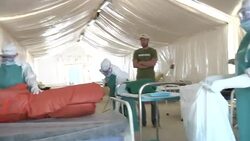 Ebola Training on Disinfecting Protective Wear News Clip