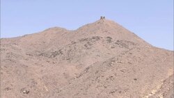 Ruins top a desert hill in the ancient city of Sikait, Egypt. Stock Footage