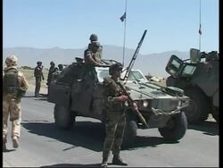 Suicide car bomber targets coalition convoy, kills bystander News Clip