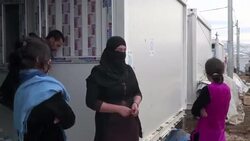 CLEAN : Iraqs displaced Yazidis hunker down as northern winter bites News Clip