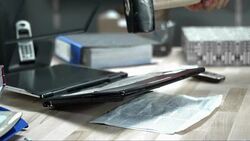 SLO MO LD Destroying the laptop with a hammer Stock Footage