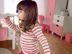 HD SLOW MOTION: Little Girl With A Paper Airplane Stock Footage