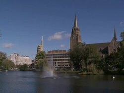 MS Etangs of Ixelles with church and flagey building / Brussels, Belgium Stock Footage