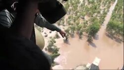 Army delivers food and supplies to people stranded by floodwaters News Clip