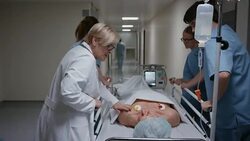 DS Doctor comforting patient on the way to operating room Stock Footage