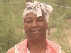 African lady looking at Camera 2- HD &amp; PAL2 Stock Footage