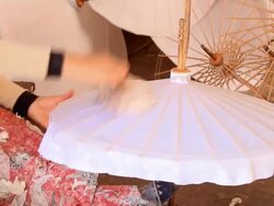 Making traditional  Umbrella Stock Footage