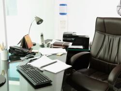 Businessman having a cup of tea in an office  Stock Footage