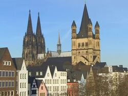 MS Shot of Frankenwerft, church Gross St. Martin and Dom (Cathedral) / Cologne, North Rhine Westphalia, Germany Stock Footage