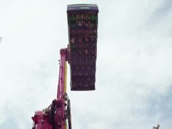 The Inverter attraction ride spins wildly on the midway at a State Fair. Stock Footage
