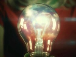 lightbulb in hand Stock Footage