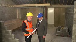 Architect and builder shake hands on Construction site : CRANE Stock Footage