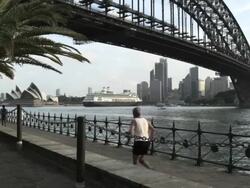 Harbour Bridge and Opera House late Afternoon with the Ocean Liner "Amsterdam" leaving, Sydney, New South Wales, Australia Stock Footage
